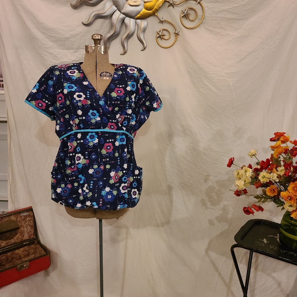 Lot of 5 scrub tops. Size large.